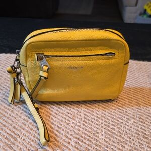 Coach Yellow‎ Wristlet Bag with Sleek Design